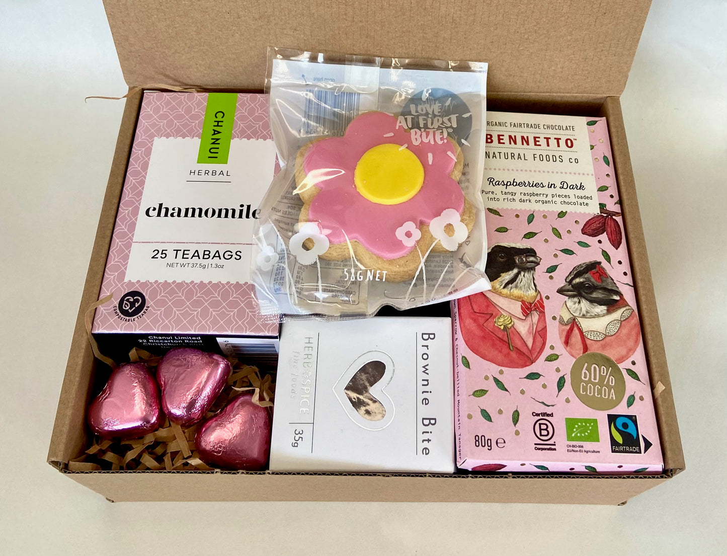 Affordable pink gift box with chocolates and tea, $39.00.
