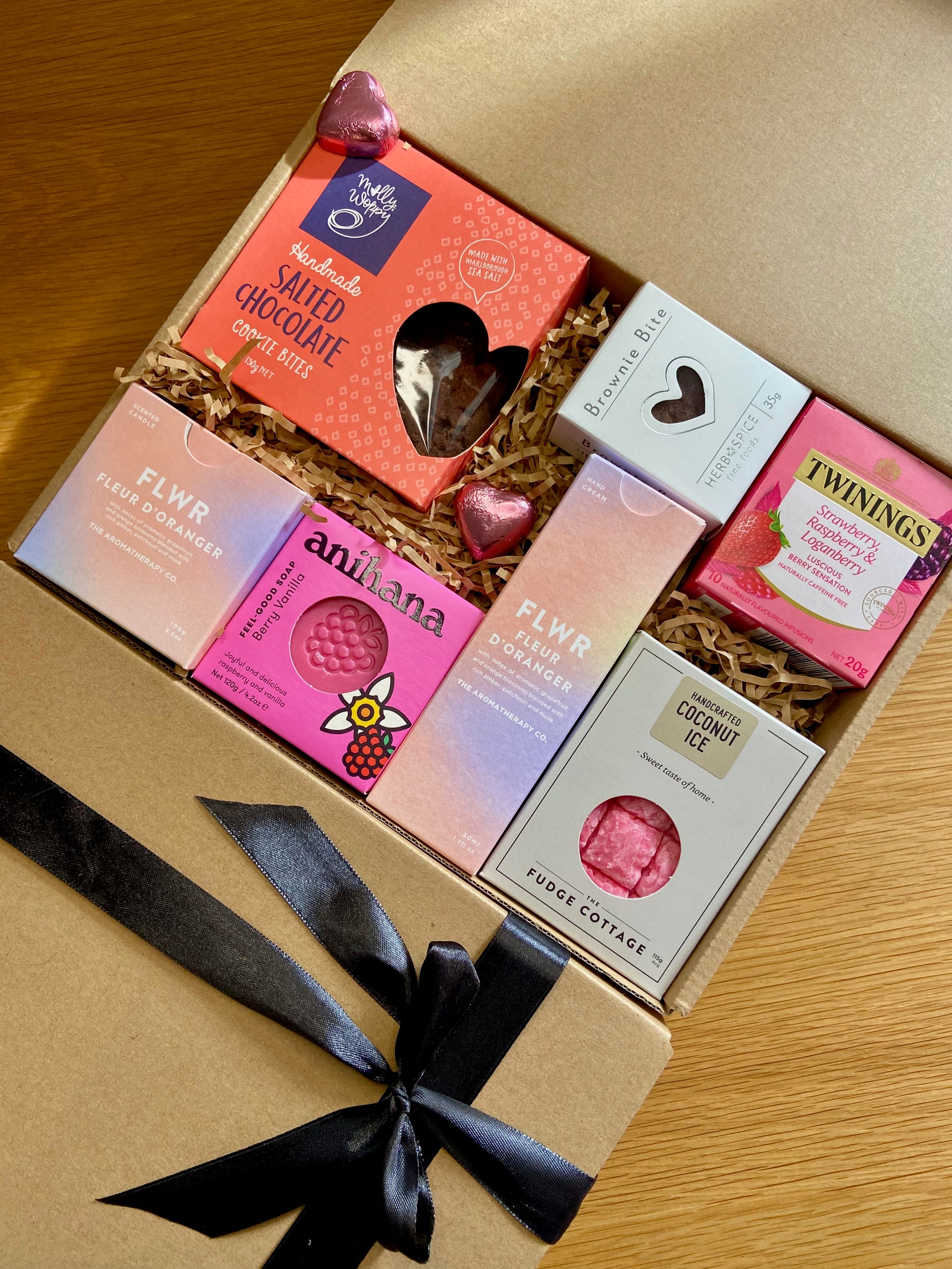 Pink pamper gift box with candle and self care products