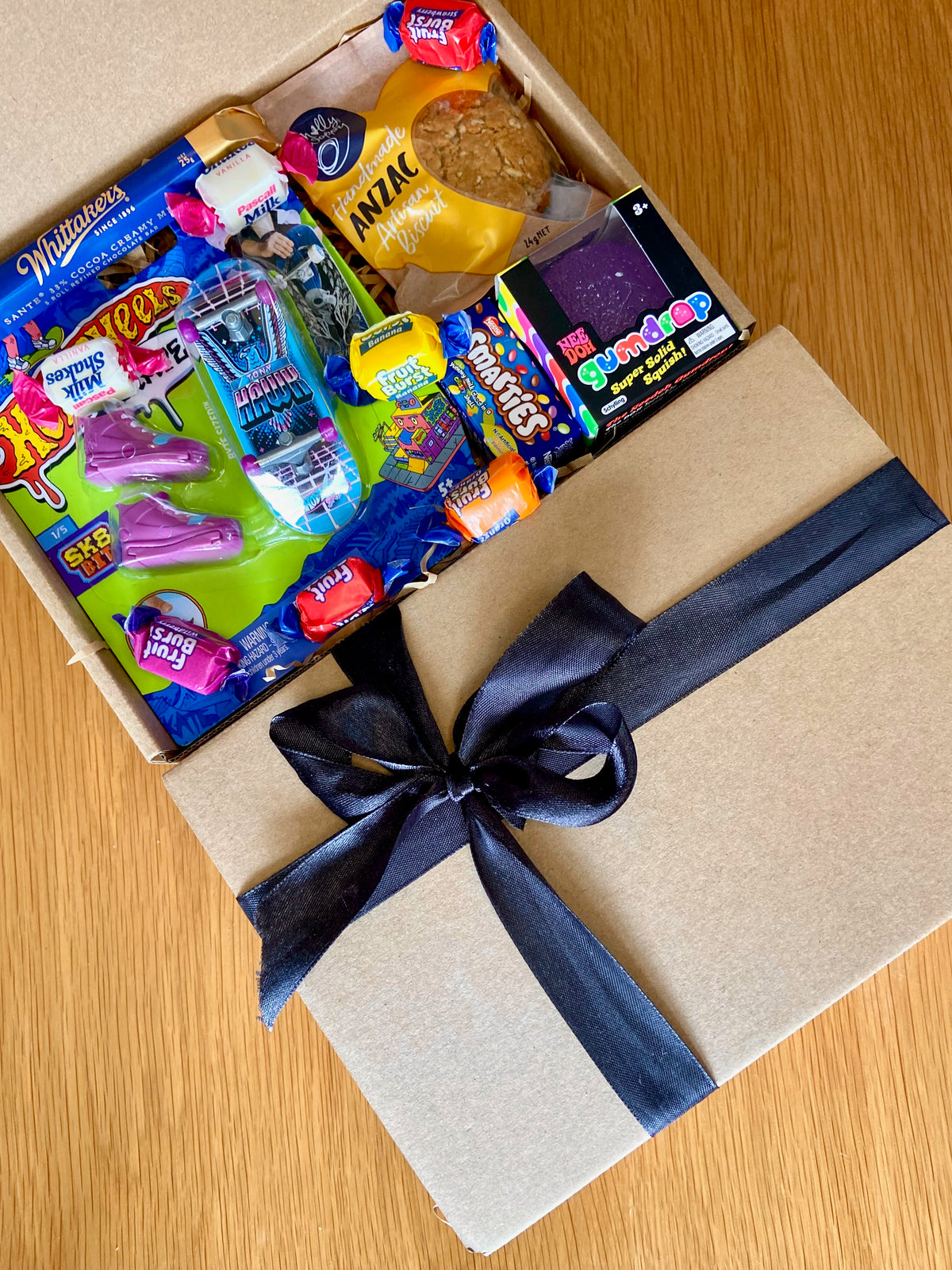 Needoh gift box for kids with Gumdrop Needoh, Hot Wheels, Smarties, Whittaker's chocolate and lollies