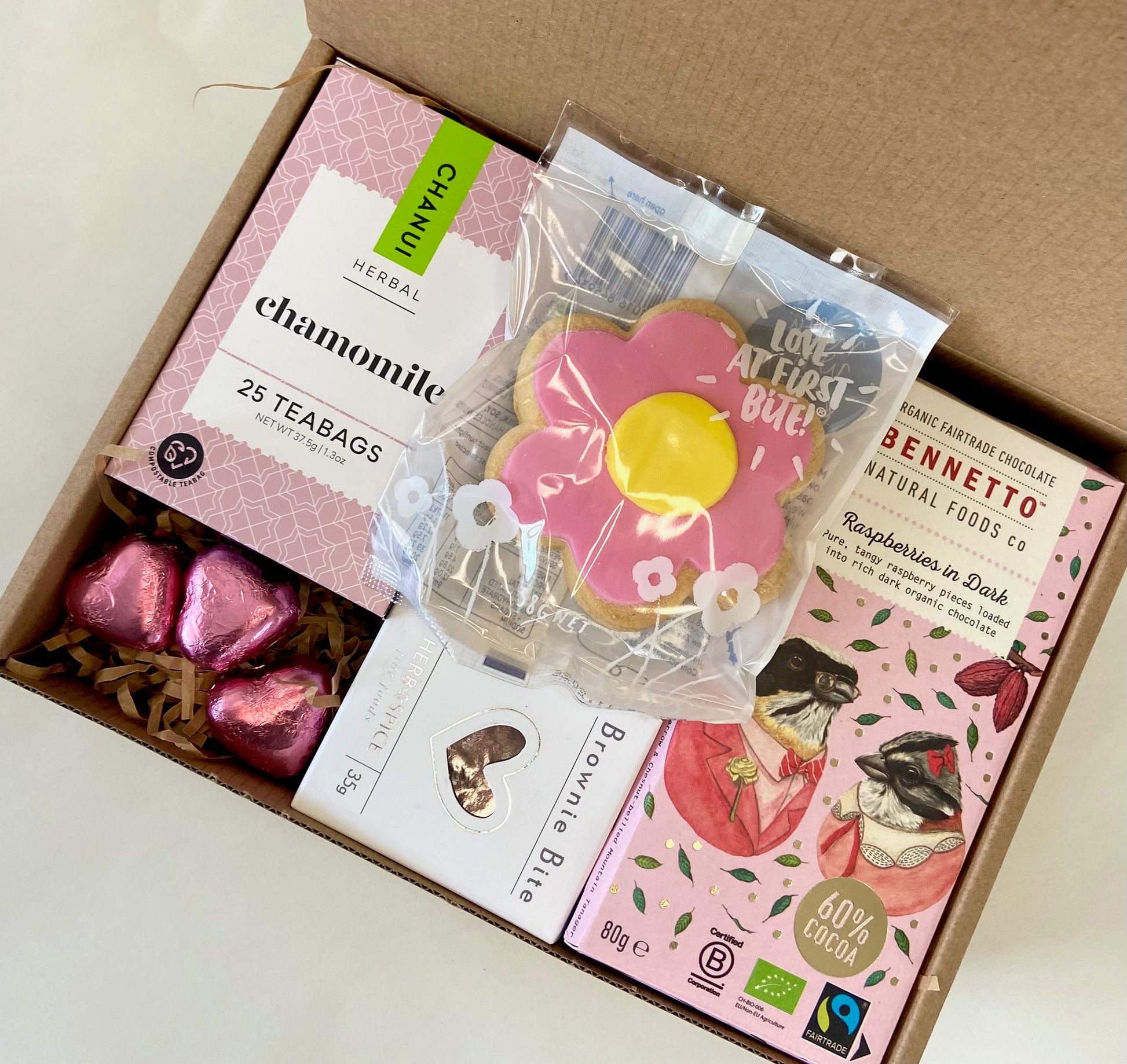 Affordable pink gift box with chocolates and tea, $39.00.