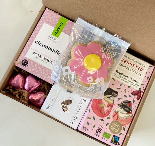 Affordable pink gift box with chocolates and tea, $39.00.