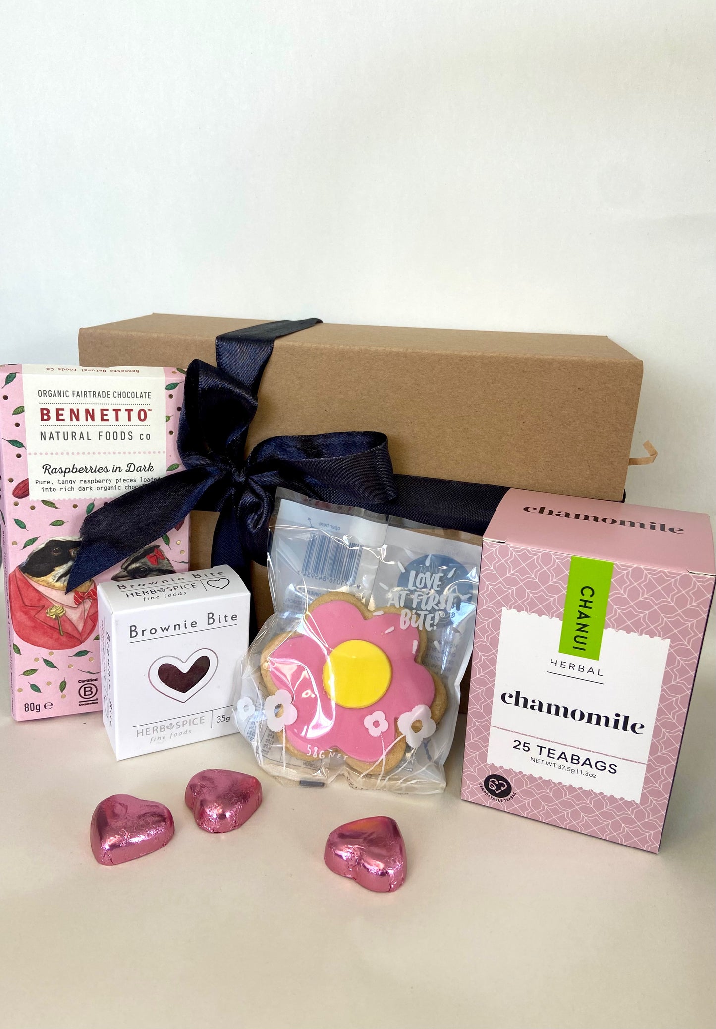 Affordable pink gift box with chocolates and tea, $39.00.