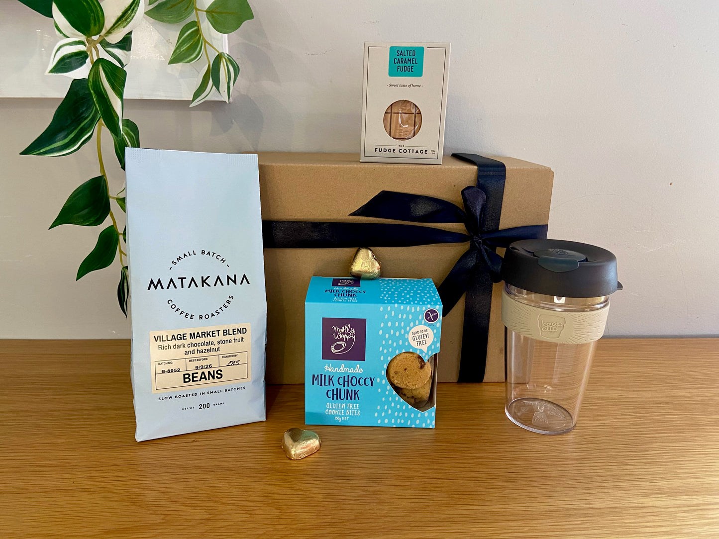 Gift set with Matakana coffee beans, cookies, re usable keep cup, fudge, pre made gift box with ribbon.